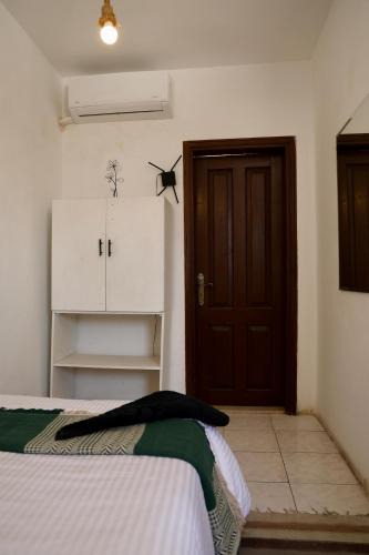 Taqseem Laselky House | A private room by the rooftop