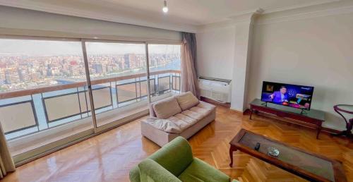 Oula Apartment | Amazing Nile & Pyramids View Apartment