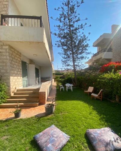 Marina El Alamein Ski Chalet | Chalet with Private Garden Green Beach North Coast