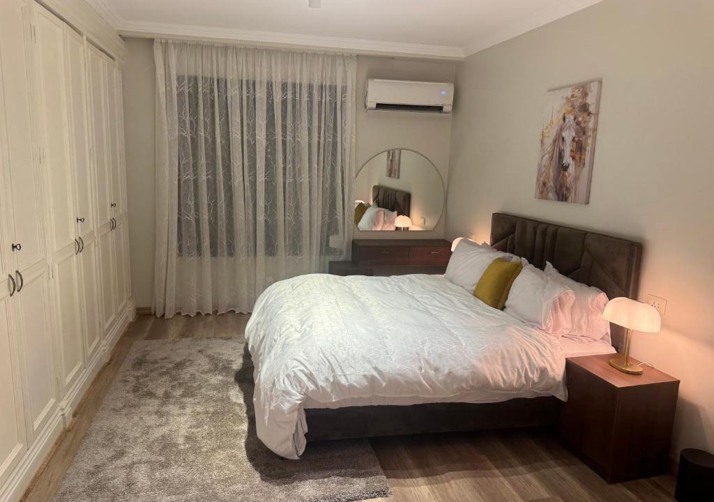 Agouza Apartment | Luxury 3-Bedroom Apartment with Garden View & Private Balcony