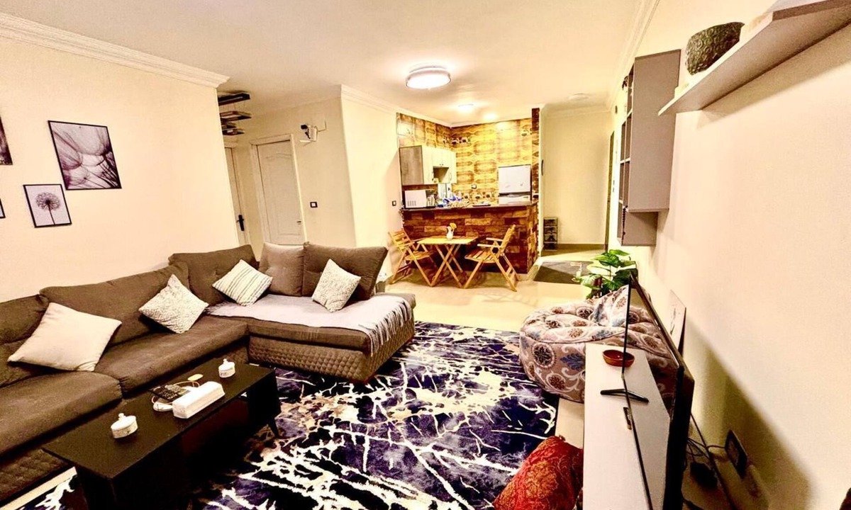Madinaty Apartment | Modern Luxury Retreat with Stunning Garden Views in B7 Heart of Madinaty Wifi/AC