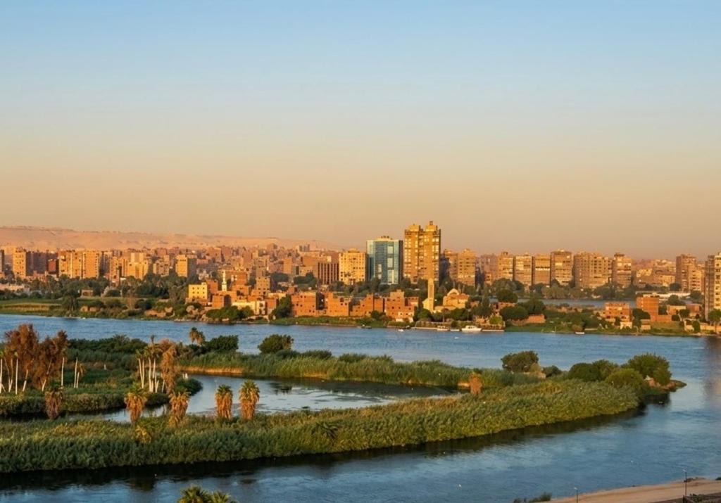 Giza Apartment | Panoramic Nile and Pharaonic Village View-1st Line