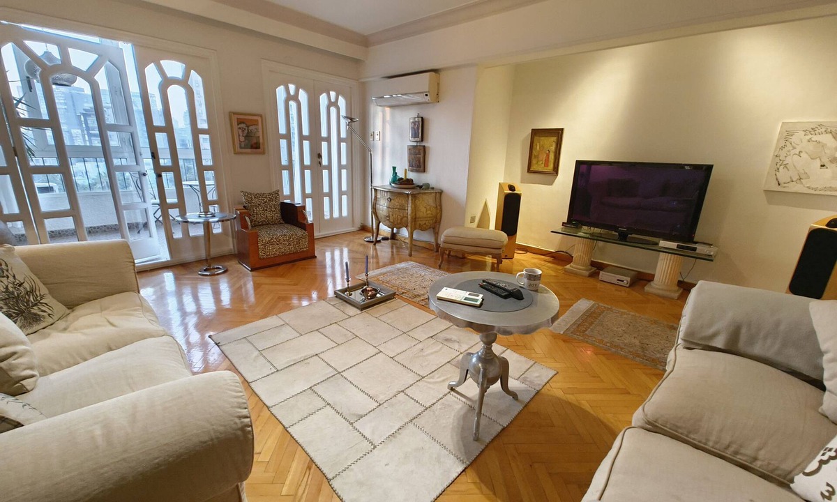 Al Duqqi Condo | Spacious 3-bedroom condo in lovely Giza Governorate with AC and fitness room