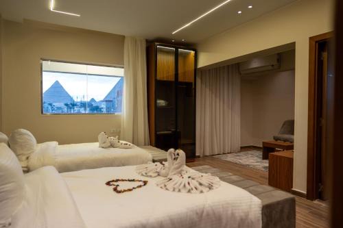 Al Haram Hotel | Tuya pyramids Queen