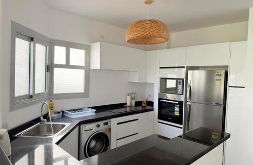 Ain Sokhna Ski Chalet | 3BR Stylish Poolside Retreat Einbay Resort
