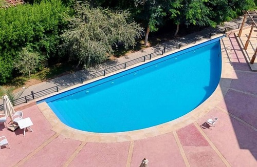 Sheikh Zayed City Apartment | Casa Studio large roof pool in beverly hills