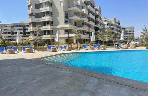Marina El Alamein Apartment | Chic Apt in Palm Hills Pool & Sea View شقة فاخرة بفيو بحر وحمام سباحة