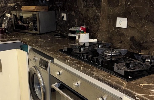 Al Duqqi Apartment | Chic Stays - Luxury 2BR Apt in Downtown Dokki