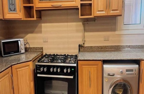 The 5th Settlement Apartment | Cozy 2BR Apartment with Private Garden | Prime Village Location