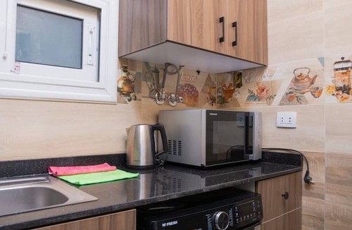 New Cairo Apartment | Designer Suite by Aura: 3BR Luxury & Bespoke Art