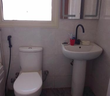 Shurtah al-Dakhlah Apartment | Empty room without furniture in an apartment