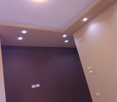 Shurtah al-Dakhlah Apartment | Empty room without furniture in an apartment