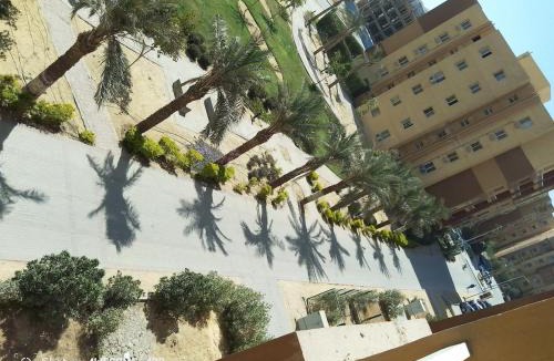 Shurtah al-Dakhlah Apartment | Empty room without furniture in an apartment