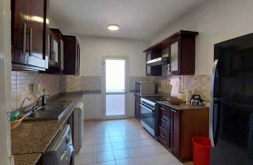 Sakkala Apartment | Family-Ready 2BR Home! Secured Resort, Pool Access & Full Kitchen.