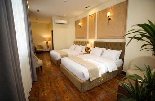Abdin Hotel | Light-Home Boutique l Urban Comfort in the Heart of Cairo Downtown