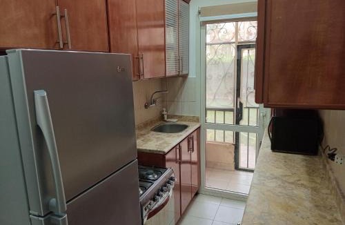 Sheikh Zayed City Apartment | Luxury King Bed with garden-Zayed Families only