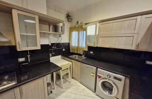 The 5th Settlement Apartment | Modern 3BR Apartment in The Village Compound | Near AUC | WiFi & Terrace