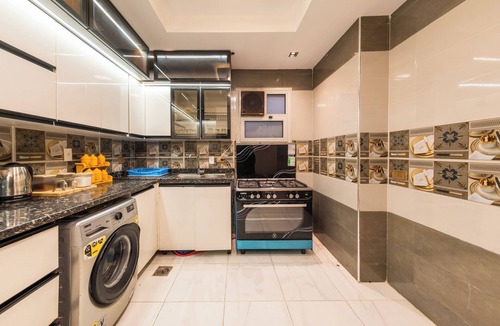 Al-'Umraniyah Apartment | Modern Chic Apartment Mohandiseen Central