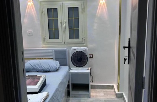 Al-Jumruk Apartment | Modern downtown apt by Qaitbay Citadel Air condition with free WiFi and Balcony with side sea view