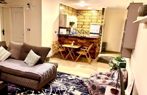 Madinaty Apartment | Modern Luxury Retreat with Stunning Garden Views in B7 Heart of Madinaty Wifi/AC