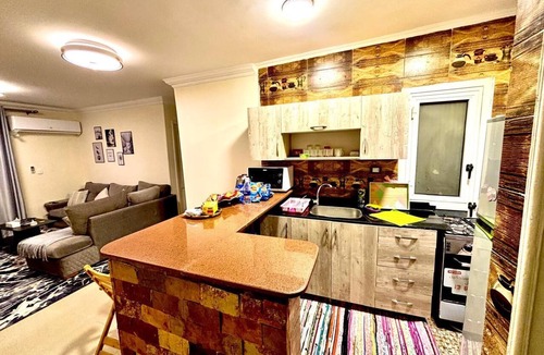 Madinaty Apartment | Modern Luxury Retreat with Stunning Garden Views in B7 Heart of Madinaty Wifi/AC