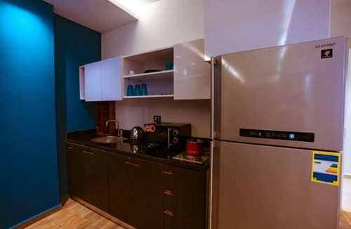 New Cairo Apartment | Modern Studio Near Cairo Airport & Festival City with Garden View