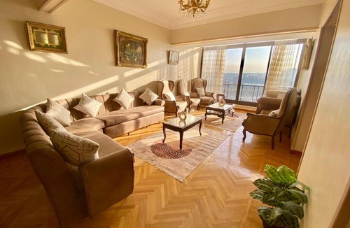 Giza Apartment | Panoramic Nile and Pharaonic Village View-1st Line