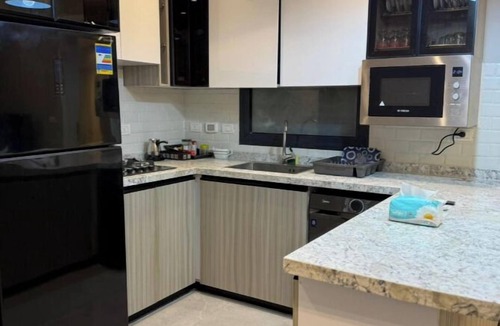 Sheikh Zayed City Apartment | Premium Suite in The Village West - Sheikh Zayed