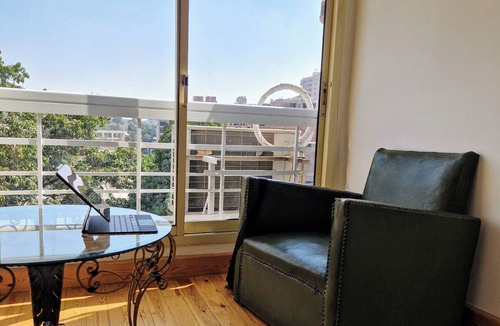 Al Duqqi Apartment | Royal Retreat in Dokki Spacious with Nile View