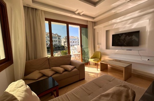 Ras Nasrani Apartment | Sharm Hills - 2BR with Pool View and Free Beach Access
