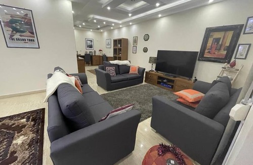 Ras Nasrani Apartment | Spacious 3 BDR with Private Backyard and Free Pool Access & Wild Beach Access