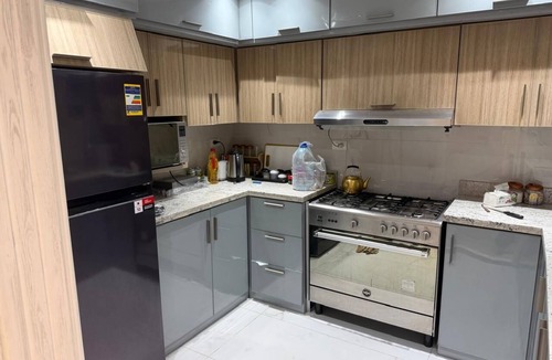 Giza Apartment | Spacious 3-bedroom apartment in tranquil Giza Governorate with AC
