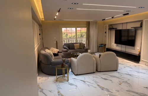 Giza Apartment | Spacious 3-bedroom apartment in tranquil Giza Governorate with AC