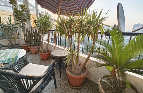 Al Duqqi Condo | Spacious 3-bedroom condo in lovely Giza Governorate with AC and fitness room