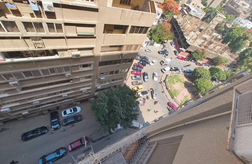 Al Duqqi Condo | Spacious 3-bedroom condo in lovely Giza Governorate with AC and fitness room