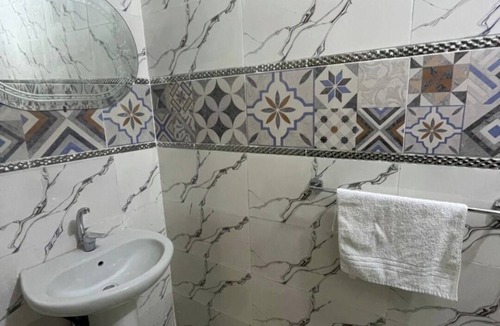 Al-'Umraniyah Apartment | Spacious 5-bedroom apartment with AC in peaceful Giza