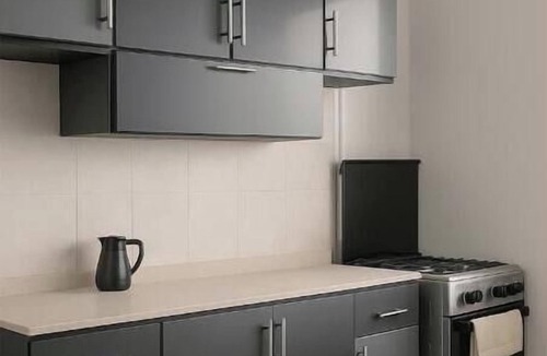 6th of October City Apartment | Stylish & Sunny 2BR Retreat – Spacious Living with Large Pool Access