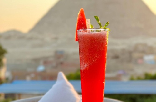 Al Haram House | Watch the Great Pyramids of Giza glow at golden sunset from our rooftop terrace.
