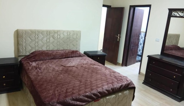 شقة 3 غرف مفروشة للايجار فى كمبوند دريم لاند - 6 اكتوبر in ‘Ezbet `Abd el-Ḥamîd