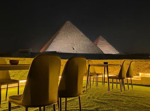 Maria Pyramids House