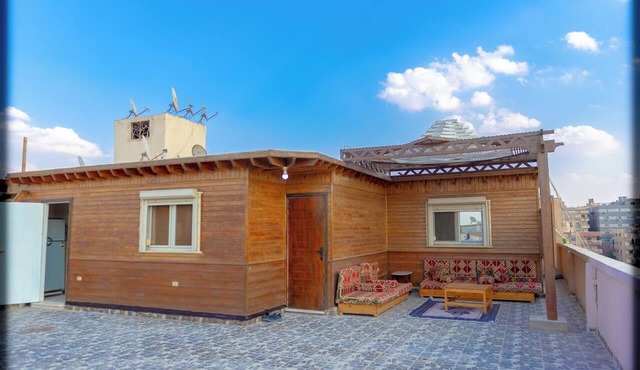 Spacious 2-bedroom apartment with Rooftop between GEM and Giza Pyramids