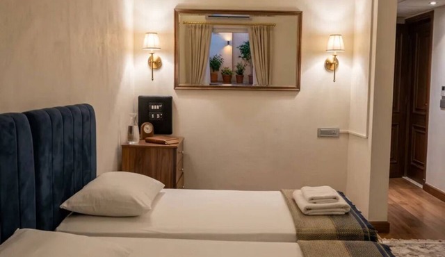 Twin Room with King Bed Setup, Wi-Fi, AC & Private Bathroom
