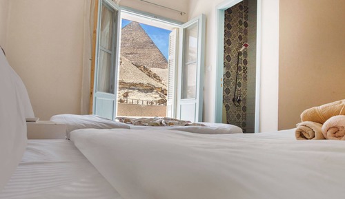 Deluxe with Balcony Pyramids View