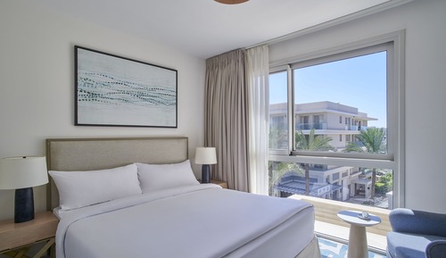 Deluxe One Bedroom Suite Partial Pool View