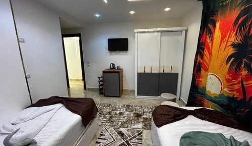 Deluxe Quadruple Room, City View