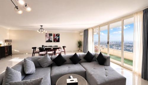 Three-Bedroom Apartment with Sea View