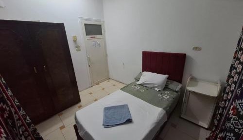 Basic Triple Room with Shared Bathroom