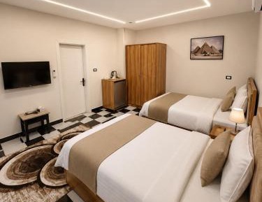 Quadruple Room with Private Bathroom