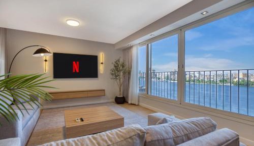 Four-Bedroom Apartment with River View