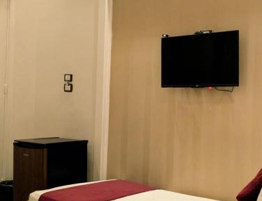Quadruple Room with Private Bathroom